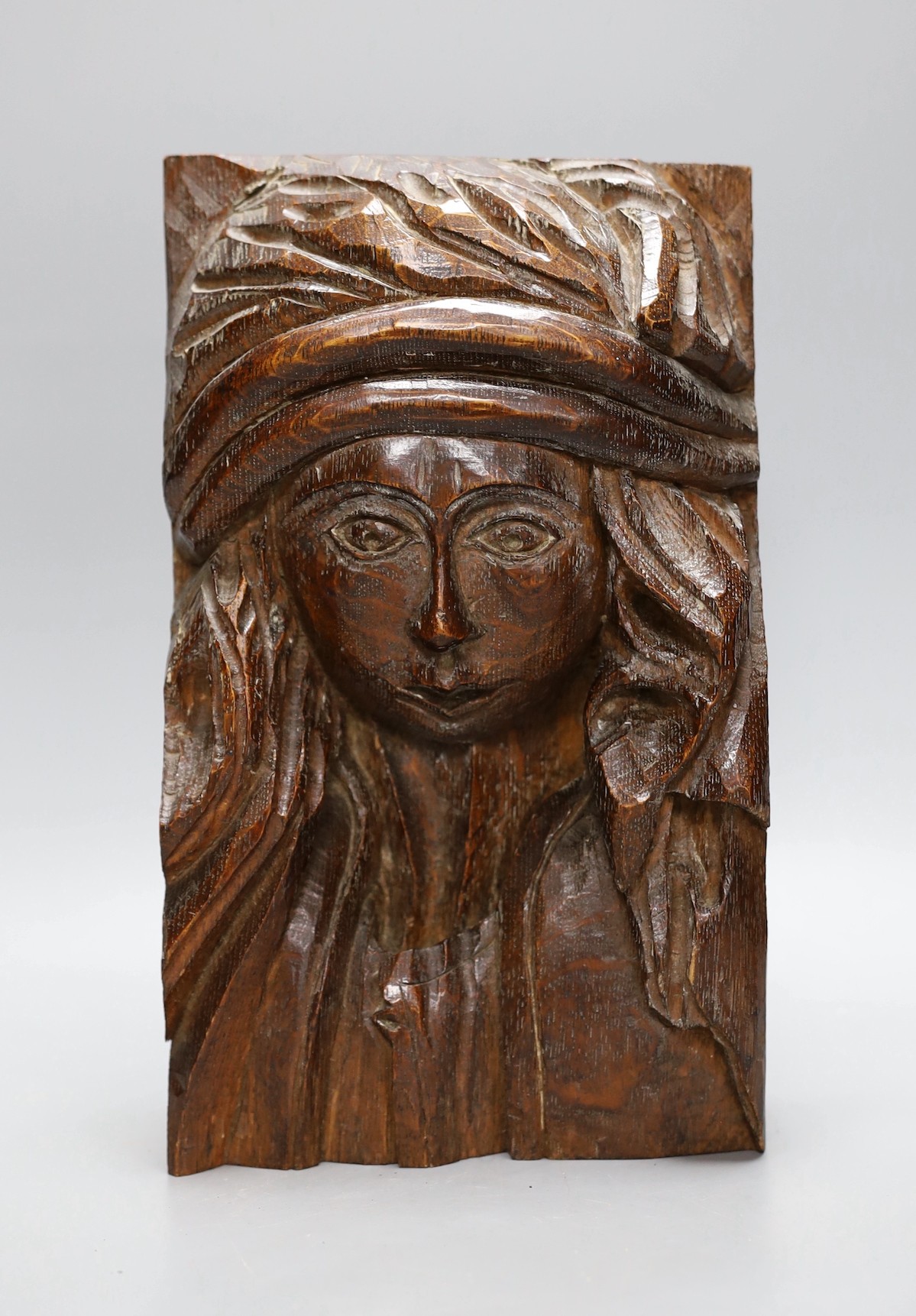 A carved oak figural appliqué, 28.5 cms high